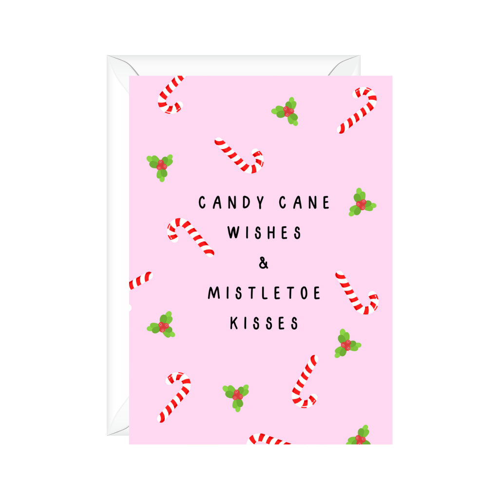 Light pink background greeting card for Christmas Holiday with mini candy canes and mistletoes stating candy cane wishes and mistletoe kisses